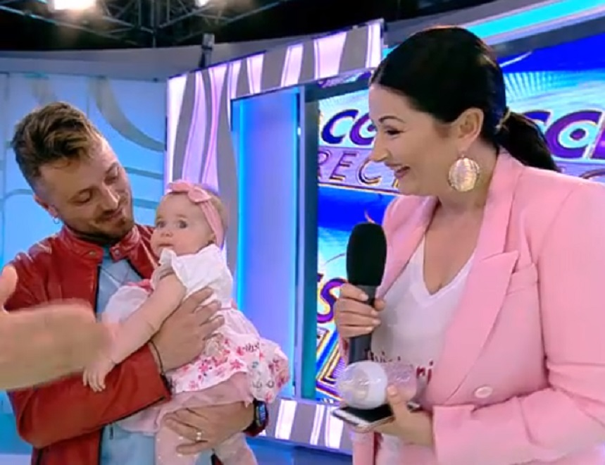 Gabriela Cristea și Tavi Clonda și-au scos fetița în public prima dată după botez