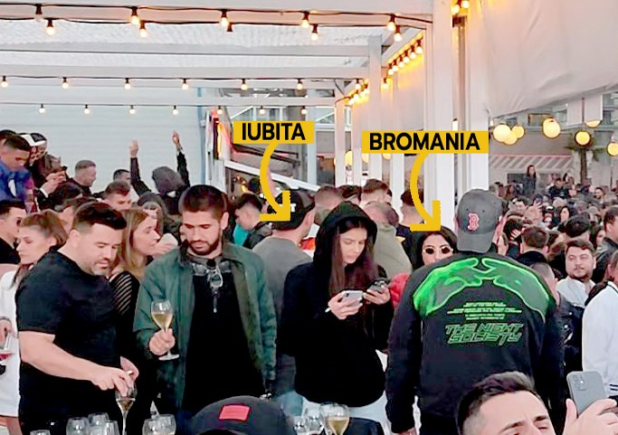 BRomania, cu spatele, atent la iubita lui care butonează telefonul (Foto: CANCAN.RO)