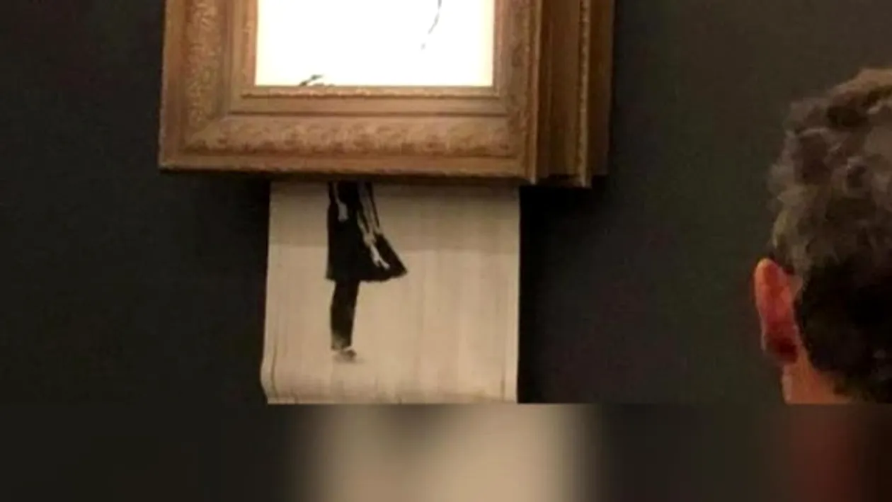Un tablou Bansky s-a autodistrus imediat ce a fost vândut cu un milion de lire sterline