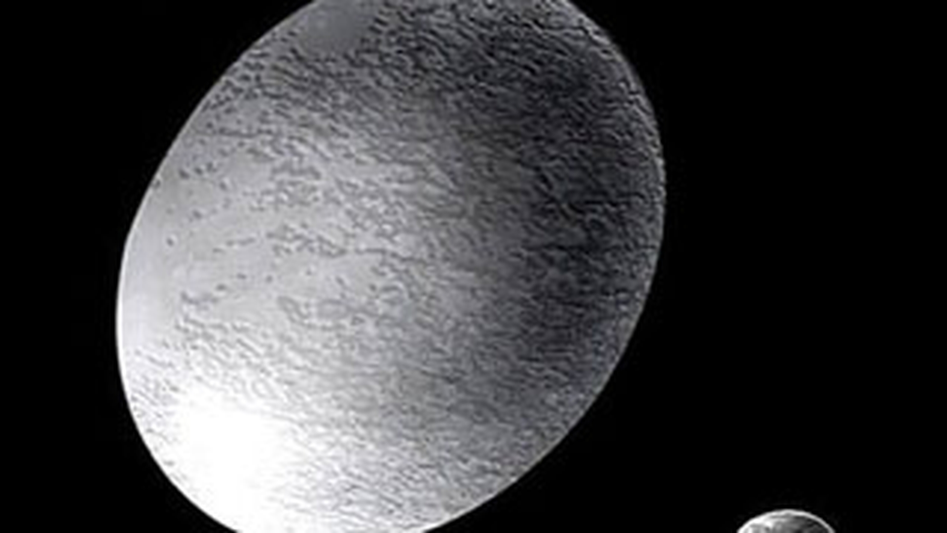 Haumea, o planeta pitica din sistemul nostru solar, este acoperita cu cristale de gheata
