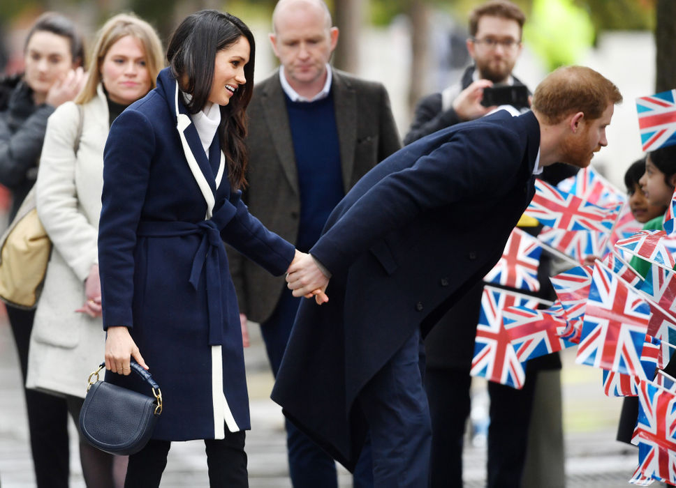 Prince Harry and Meghan Markle visit Birmingham. Prince Harry and Meghan Markle meet members of the public on a walkabout during a visit to Millennium Point in Birmingham, as part of the latest leg in the regional tours the couple are undertaking in the run-up to their May wedding. Picture date: Thursday March 8, 2018. See PA story ROYAL Harry. Photo credit should read: Joe Giddens/PA Wire URN:35420201