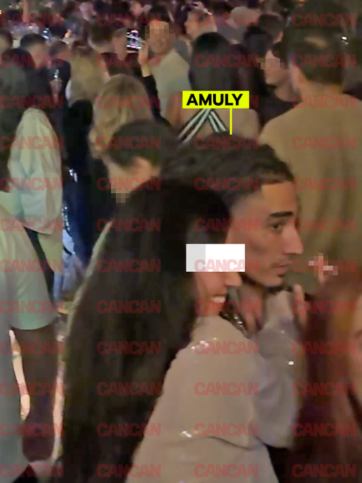 Amuly, cu o brunetă misterioasă în club