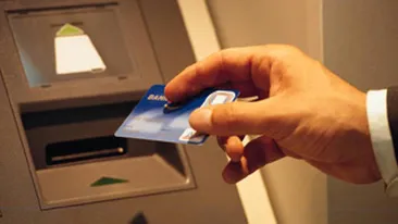 Trei romani au fost arestati in Marea Britanie pentru clonare de carduri!