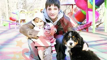 A pus sub brad un Ciobanesc de Berna