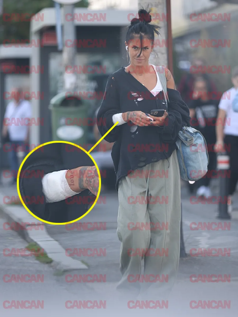 Livia Eftimie, după ce a ieșit de la clinica medicală. Pe mâna dreaptă are o branulă bandajată