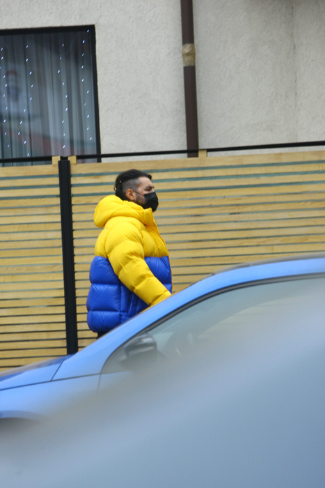 Smiley, în timp ce se îndrepta spre mașina lui