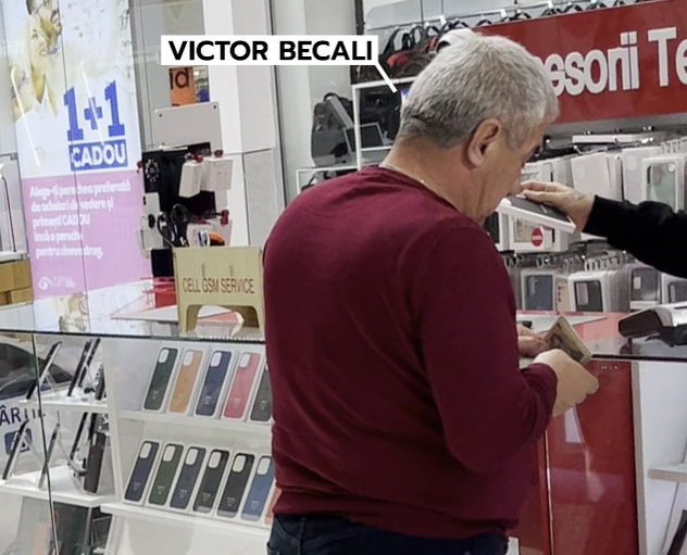Victor Becali se uită-n portofel și scoate banii pentru a-și plăti husa pentru telefon