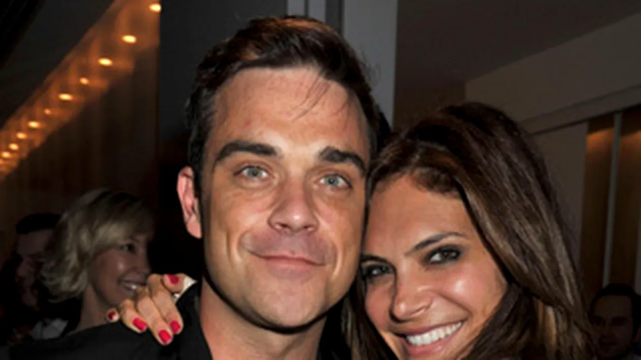 Robbie Williams a cumparat un tablou de 36.000 de euro pentru fiica lui nenascuta!