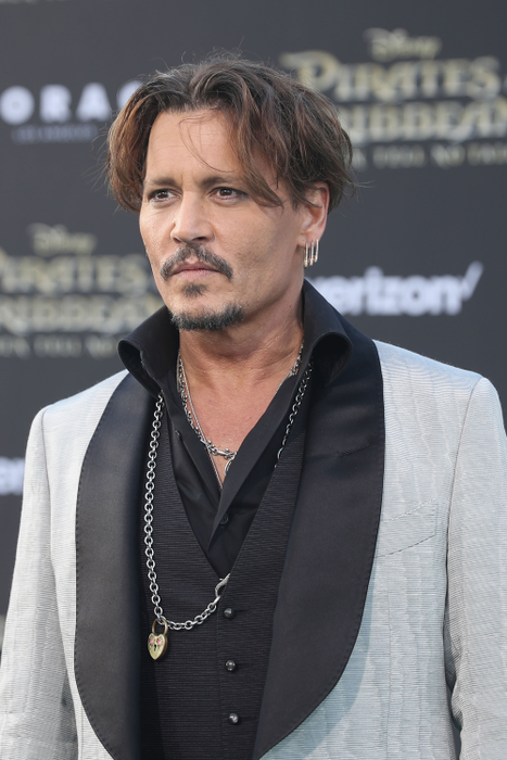 HOLLYWOOD, CA - MAY 18: Actor Johnny Depp at the Premiere of Disneys and Jerry Bruckheimer Films Pirates of the Caribbean: Dead Men Tell No Tales, at the Dolby Theatre in Hollywood, CA with Johnny Depp as the one-and-only Captain Jack in a rollicking new tale of the high seas infused with the elements of fantasy, humor and action that have resulted in an international phenomenon for the past 13 years. May 18, 2017 in Hollywood, California.  (Photo by Rich Polk/Getty Images for Disney)