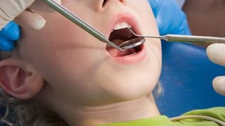 12% dintre romani nu merg deloc la dentist