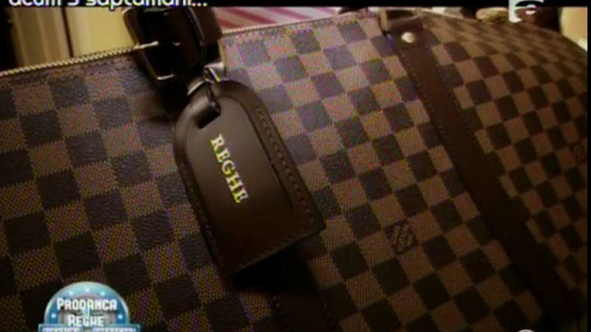 Supertare! Reghe s-a dat in fapt in Vegas la magazinul Louis Vuitton - Si-a luat geanta cu numele lui pe ea si curele cu logo mare sa se vada bogatia - "Nici lautarii nu sunt ca tine!"