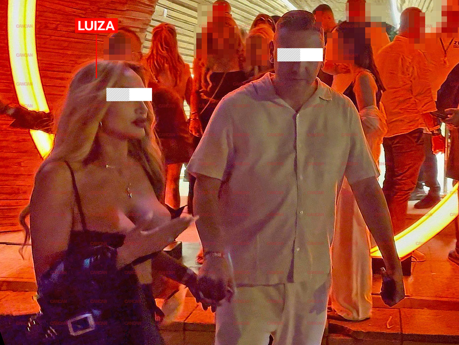 A plecat din club de mână cu un bărbat misterios