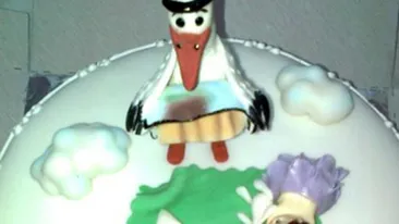 Gabi Firea si Florentin Pandele au primit un tort cu gemeni si o barza din martipan, de la nasi