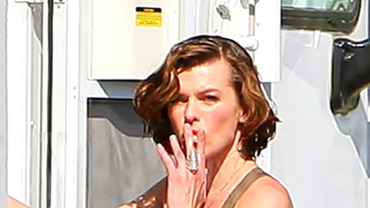 Ce face Milla Jovovich pe platourile de filmare? Pauza de tigara si de... sot