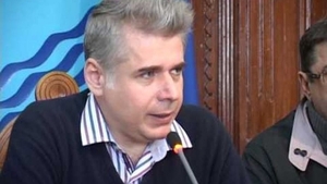 HALUCINANT! Un demnitar din Romania a fost prins in timp ce negocia ASASINAREA unei colege!