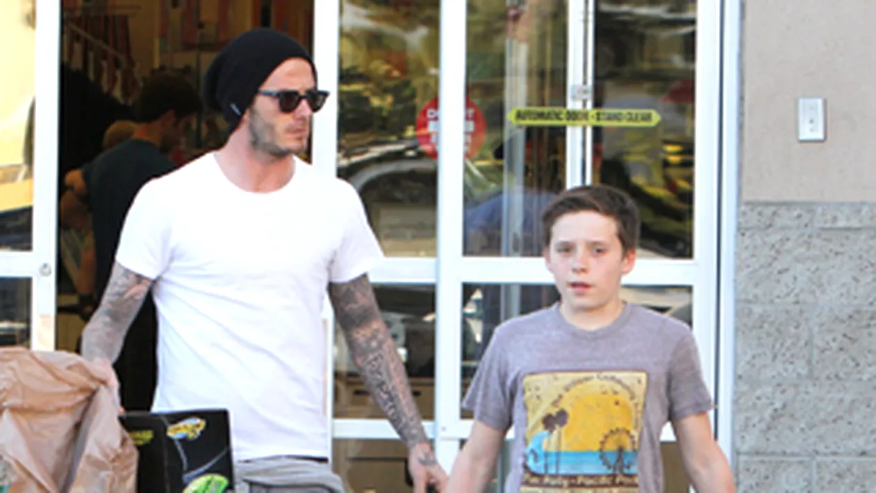 David Beckham, cu sacosele pline de jucarii