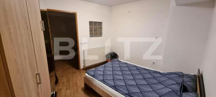 Dormitorul din boxa transformată în apartament Sursă foto: Blitz.ro