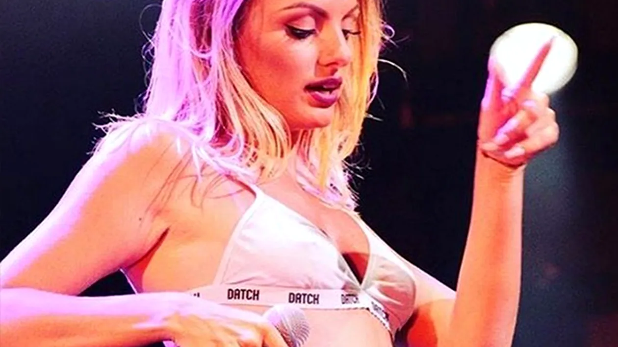 ALEXANDRA STAN, într-o ţinută de infarct! S-a pozat în pat, într-o pereche de ciorapi cu bandă, sandale cu toc şi...