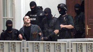 Legatura incredibila dintre cel mai sangeros criminal grec si o romanca! O fosta menajera vrea sa-l ajute sa devina calugar!