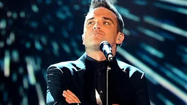 Robbie Williams a primit un ULTIMATUM din partea colegilor de trupa! Ce decizie importanta trebuie sa ia