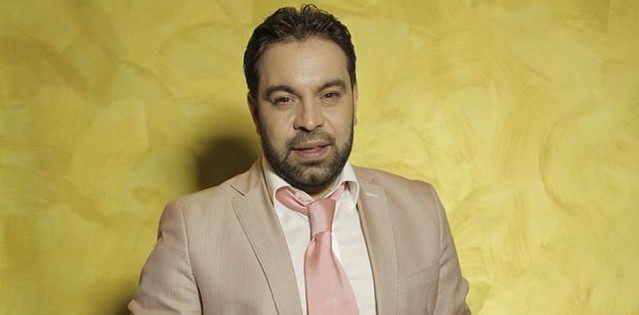 Prima apariţie a lui Florin Salam după ce s-a retras din muzică. Cu cine a fost surprins la o terasă