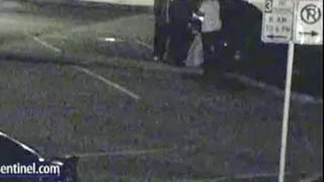 VIDEO Un barbat beat crita, jefuit si snopit in bataie intr-o parcare!