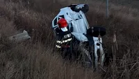 Accident de circulație pe A1, la kilometrul 103. Două autoturisme implicate, unul dintre ele s-a răstunat pe câmp