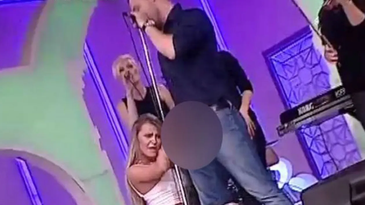 Stefan Stan are lipici la femei! La propriu! O blonda i-a mangaiat barbatia in timp ce canta o melodie