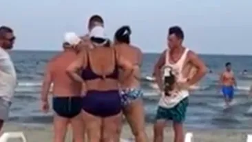 Scene incrediile pe o plaja din Mamaia! Femeie batuta cu bestialitate de un angajat! MOTIVUL SOCANT de la care a plecat totul