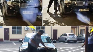 Imagini halucinante surprinse în Brăila! Cui îi aparţine BMW-ul pe care îl spală aceşti poliţişti!