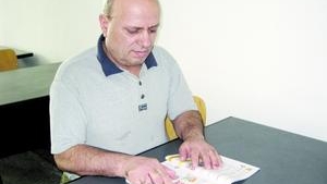Un puscarias de 61 de ani, in clasa a III-a