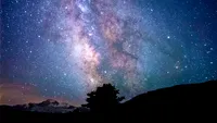 Avem imaginile. Cum va arăta cerul peste 4 miliarde de ani, după ce Calea Lactee se va ciocni cu galaxia Andromeda