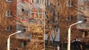 VIDEO! Momentul în care tânăra din Craiova se aruncă de la etaj și este salvată cu cearșaful de vecini