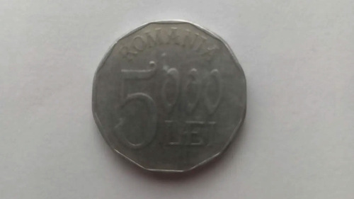Mai ții minte celebra monedă de 5.000 lei din anul 2002?! Cu ce preț se vinde acum, în martie 2023