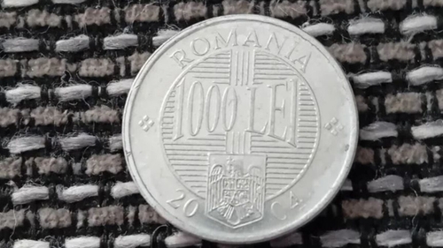 Mai ai așa ceva acasă? Prețul ireal la care se vinde o monedă de 1.000 de lei din anul 2004, acum, la două decenii distanță