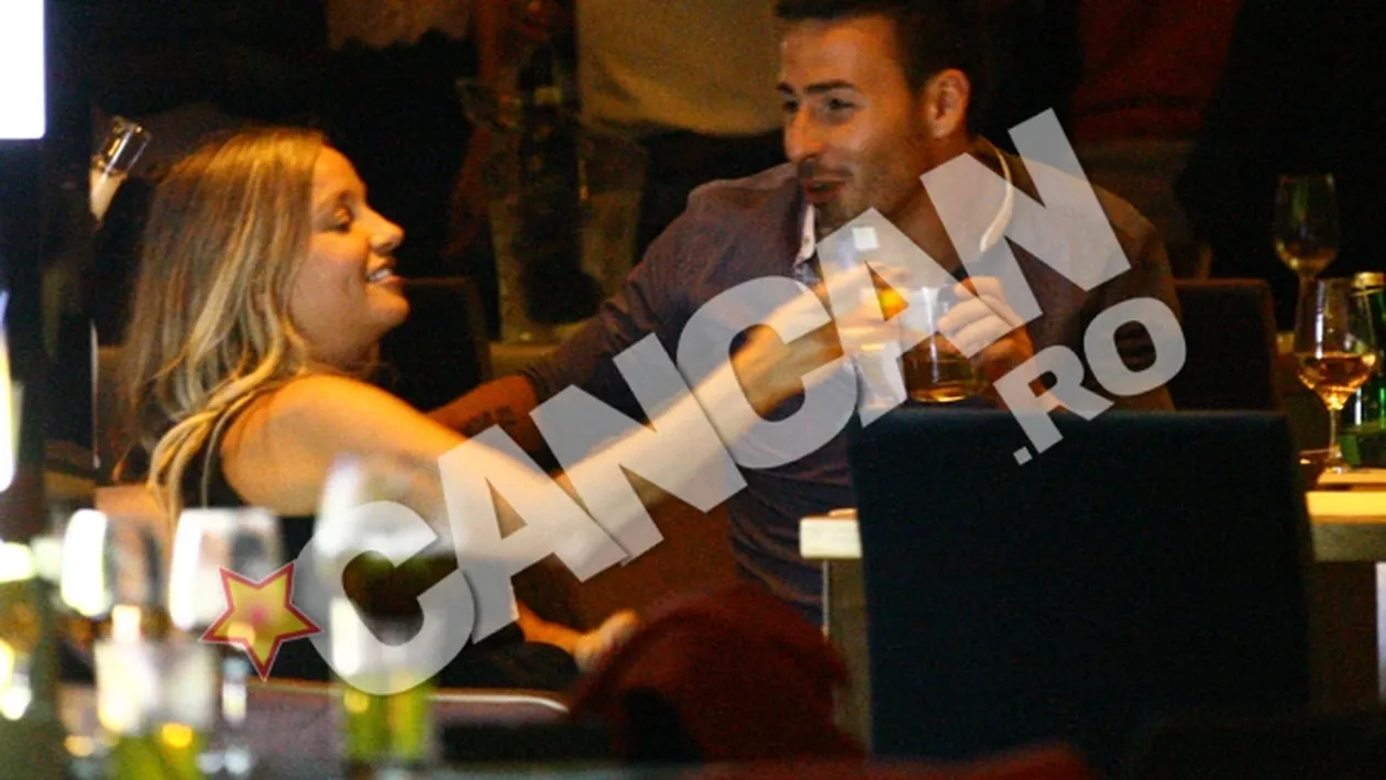 Fotbalistul i-a cantat la ureche, au dansat imbratisati sI s-au comportat ca sI cum ar fi fost singuri in local. Ce indragostiti sunt Tania Budi sI Adrian Cristea!