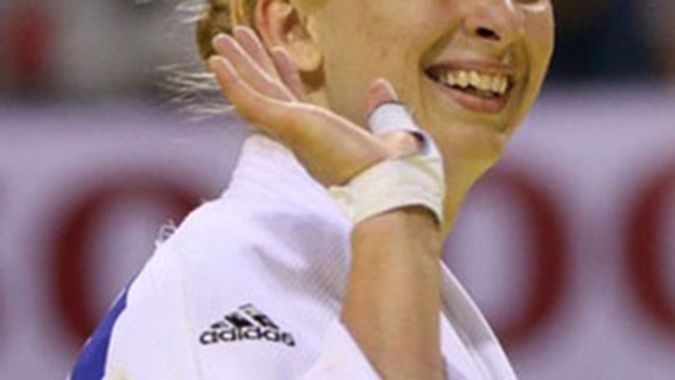 Alina Dumitru se retrage: "M-am saturat de accidentari, am obosit"! Campioana a luptat la Londra cu o entorsa la mana, un deget scrantit, gatul si coloana trosnita