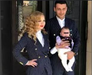 Ionut si Alessia,  la botezul copilului când formau o familie fericită