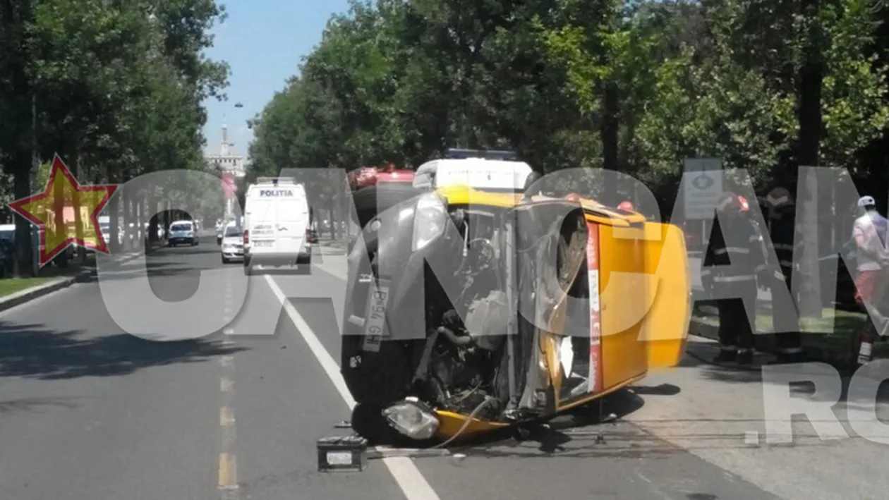 Accident grav in centrul Capitalei dupa ce doua masini s-au rasturnat. Afla ce s-a intamplat