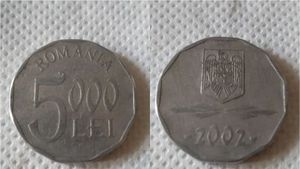 Tu mai ai deții așa ceva? Prețul ireal la care se vinde o monedă de 5.000 de lei din anul 2002, acum, la 21 de ani diferență