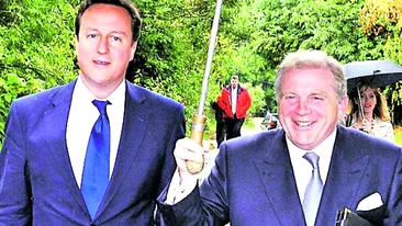 Un prieten al premierului britanic! A facut infarct in WC