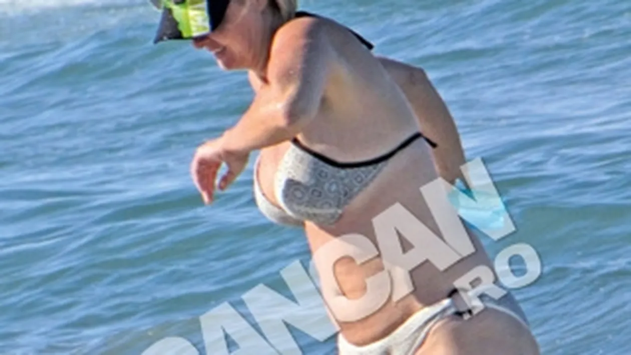 Au facut valuri pe litoral! Adrian Enache si Iuliana Marciuc, la soare dupa ce s-au harjonit in mare!