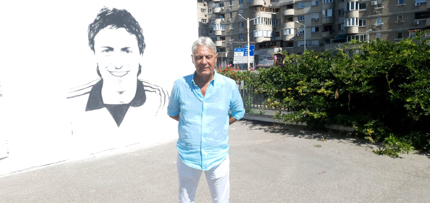 Un craiovean talentat! După ce a pictat chipul lui Ilie Balaci, acum l-a pictat și pe Sorin Cârțu pe unul dintre zidurile Craiovei. FOTO