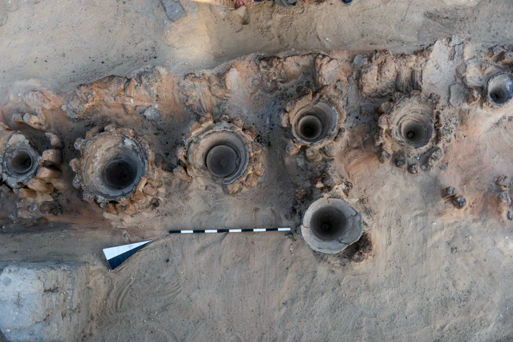 An undated handout photo made available by the es on 14 February 2021 shows the remains of a brewery uncovered in the ancient city of Abydos at Sohag Governorate in Egypt. Dr. Mustafa Waziri, Secretary-General of the Supreme Council of Antiquities, said on 13 February 2021 that the beer factory is likely to date back to the era of King Narmer, around 3,100 BC. Archaeologists unearthed eight units for the production of beer at the site, each containing about 40 pottery basins arranged in two rows used to heat a mixture of grains and water.  EPA-EFE/ES / HANDOUT  HANDOUT EDITORIAL USE ONLY/NO SALES,Image: 590981937, License: Rights-managed, Restrictions: HANDOUT EDITORIAL USE ONLY/NO SALES, Model Release: no