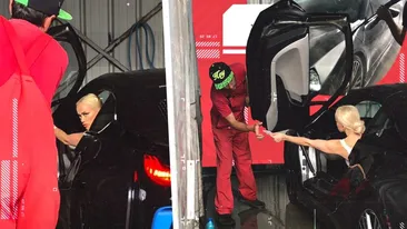 Anda Adam a învățat să păstreze distanța și la spălătorie. Nu s-a dat jos din i8 nici când...