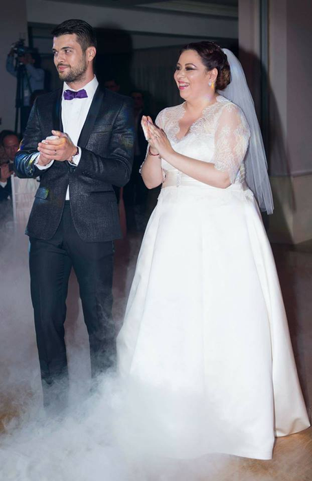 Oana Roman şi Marius Elisei în ziua nunţii lor