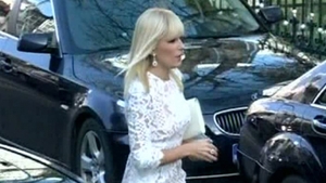 Elena Udrea a atras toate privirile la "botezul anului". Cum a putut să se imbrace la biserica. Cu greu o recunosti