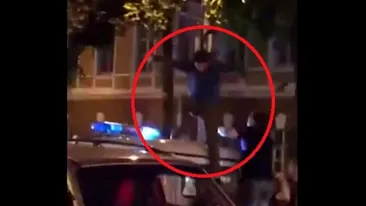 VIDEO | Ce-a pățit un rus care, de bucurie că echipa sa a bătut Spania, a sărit pe duba poliției