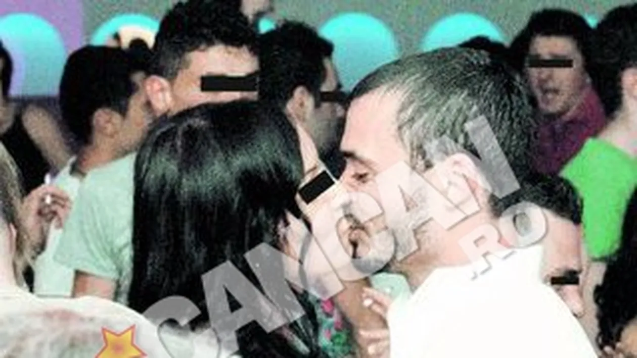 Burlacul Edward s-a sarutat patimas cu o bruneta, in club