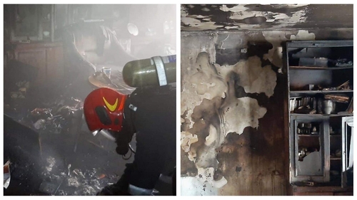 VIDEO | Captivă în apartamentul cuprins de flăcări, o femeie obeză a fost salvată în ultimul moment de vecinii ei